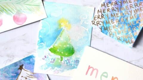 5 different holiday cards done with watercolor paint.