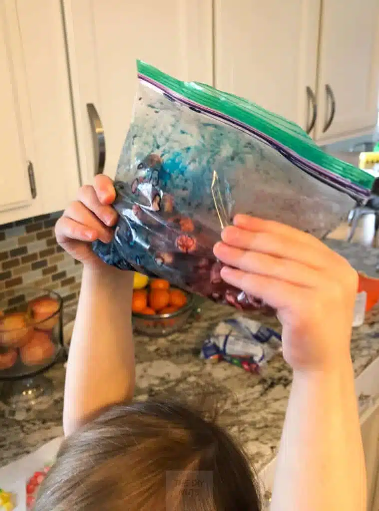 Mixing Purple Colored Marshmellows with food coloring