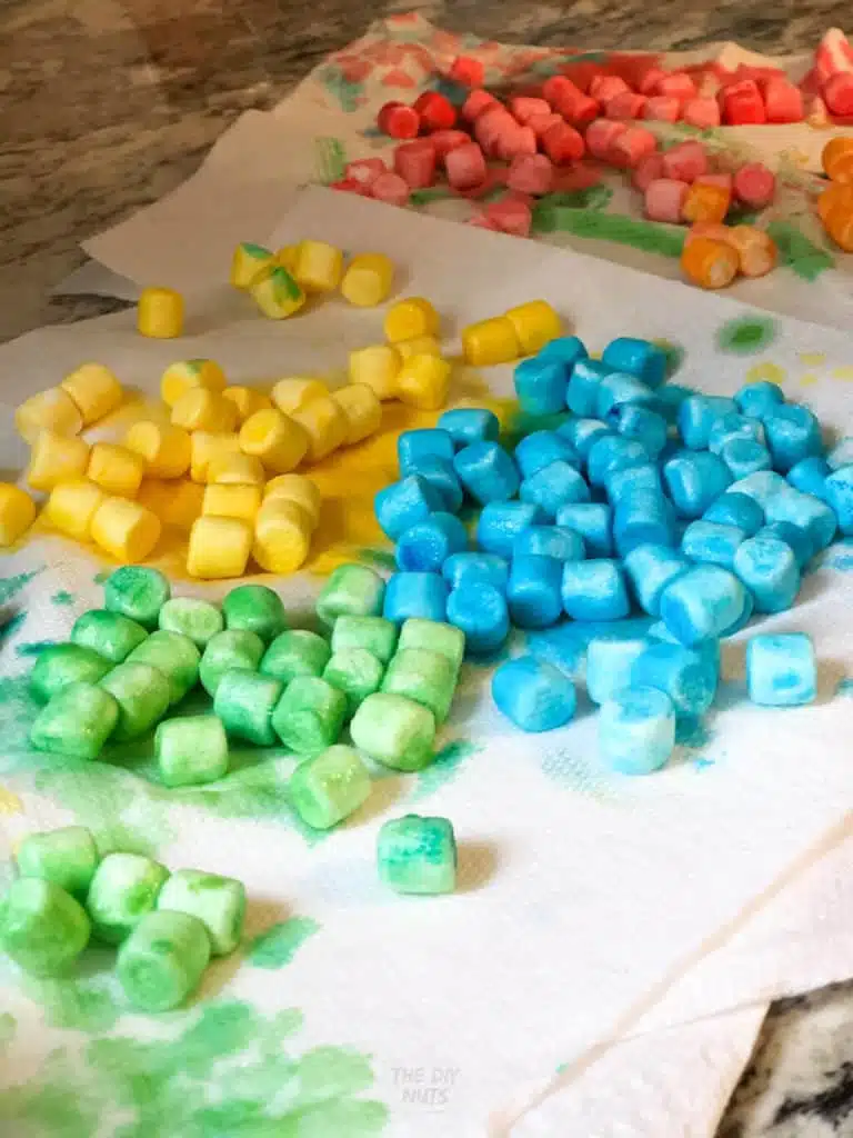 Colored marshmallows drying for rainbow craft