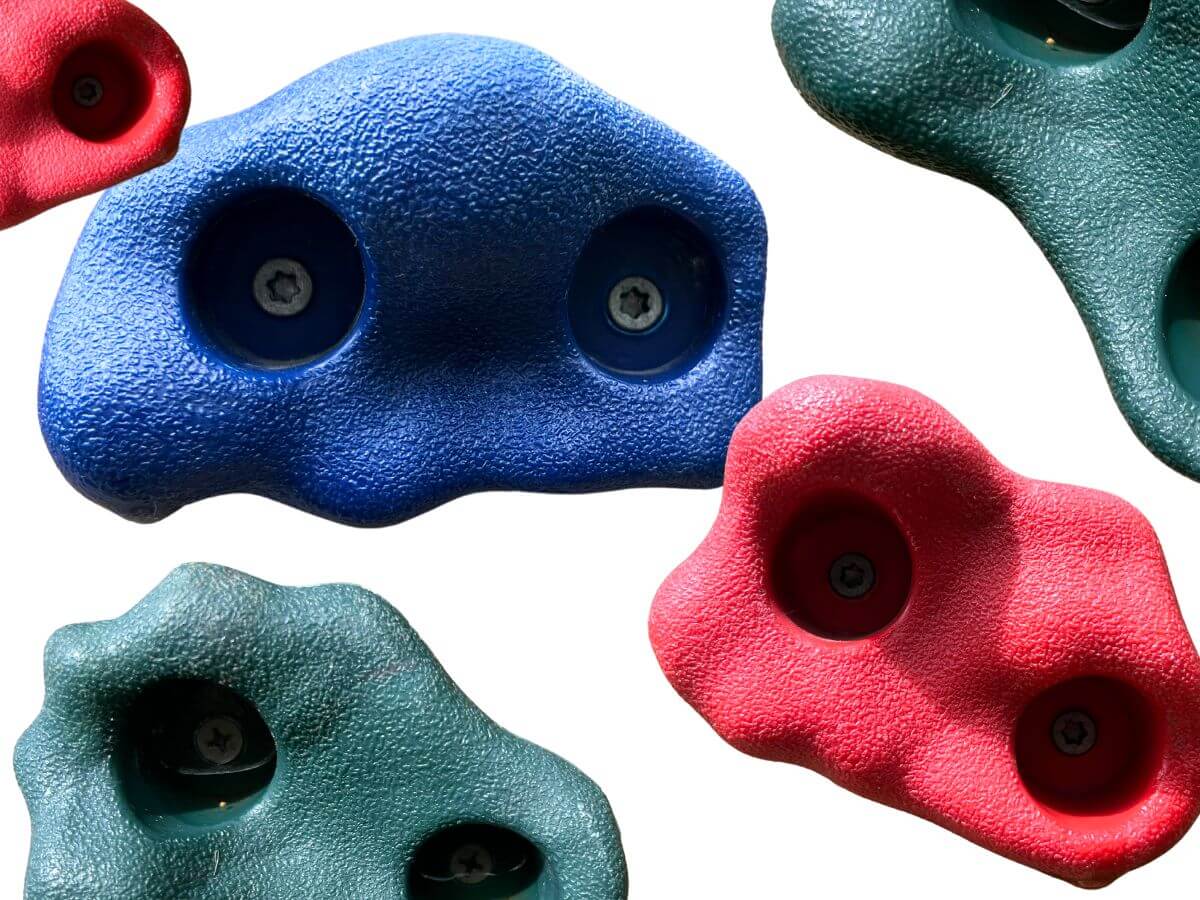 red, blue and green climbing rock holds.