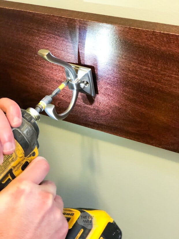 Drill screwing in home depot wall hooks