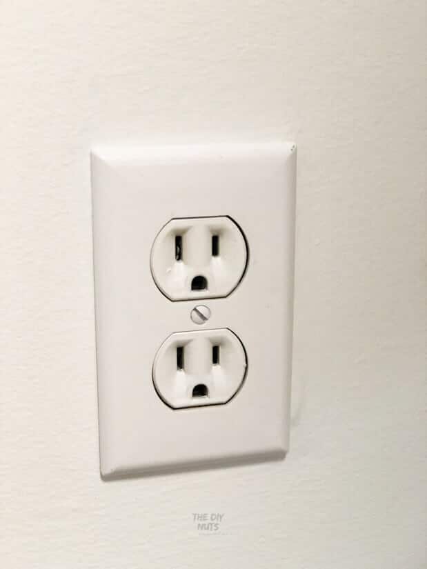 spray painted outlet with new cover