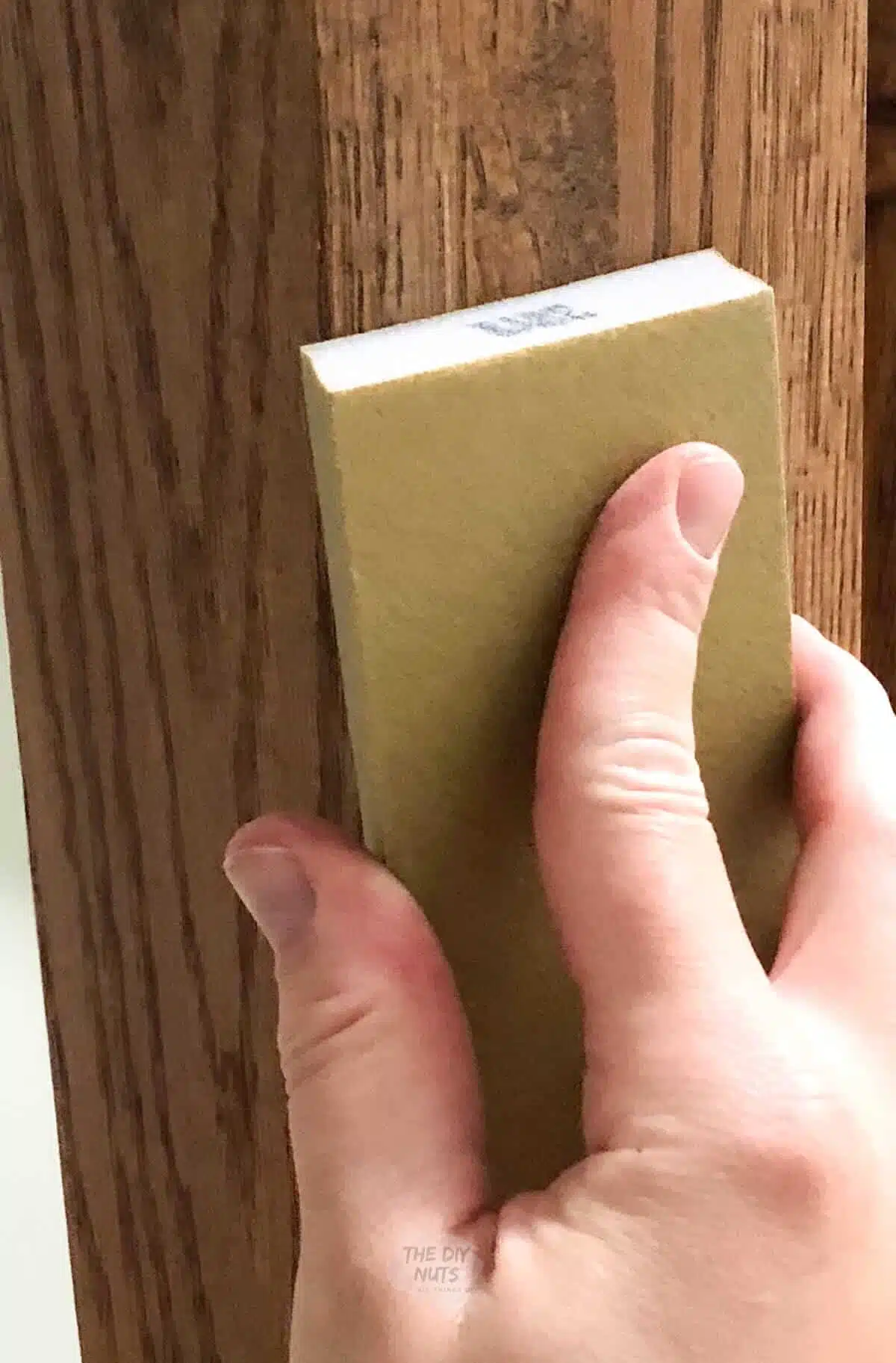 sandpaper block used to prep oak cabinets before painting