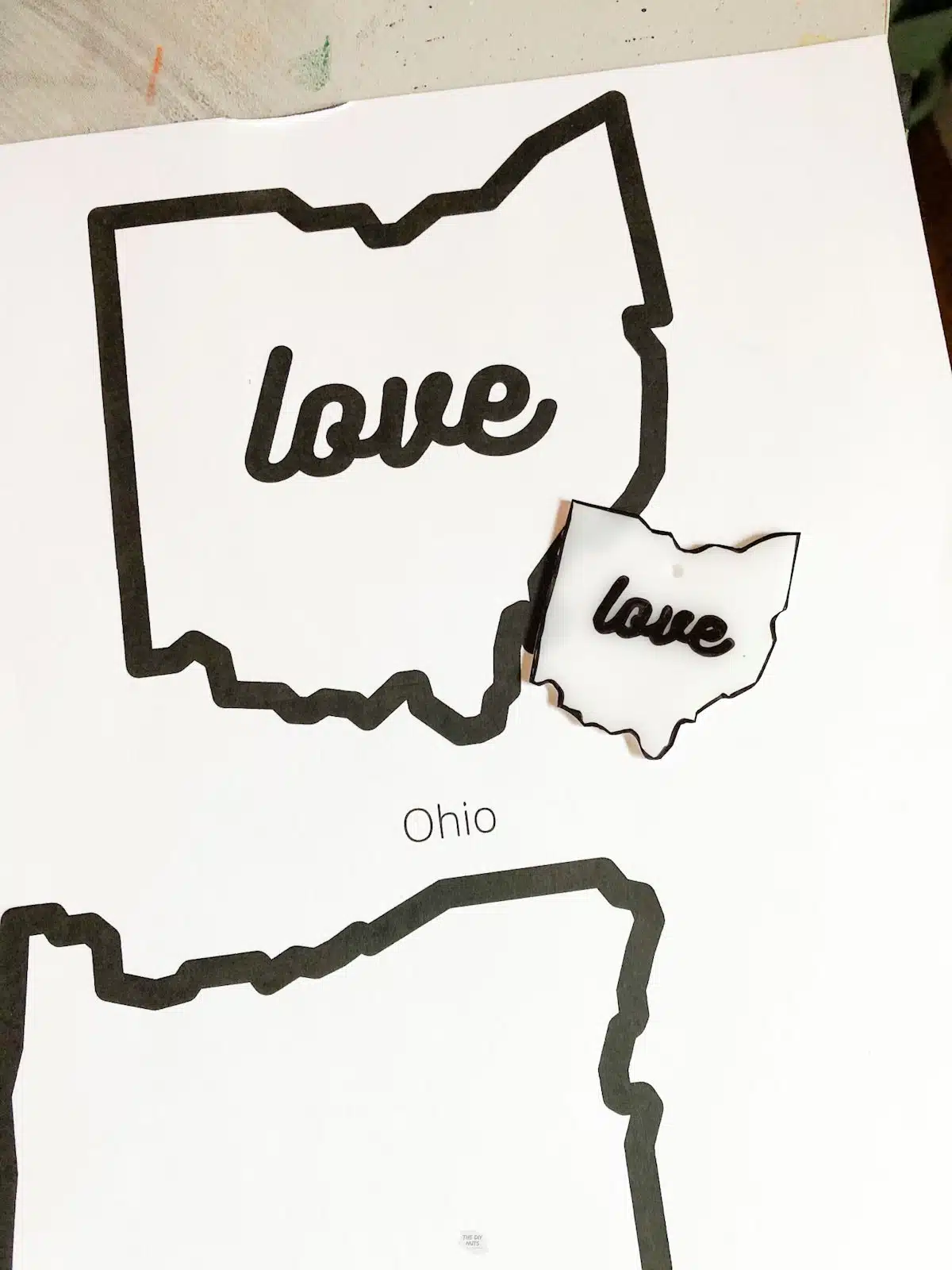 state craft on plastic next to template of Ohio.