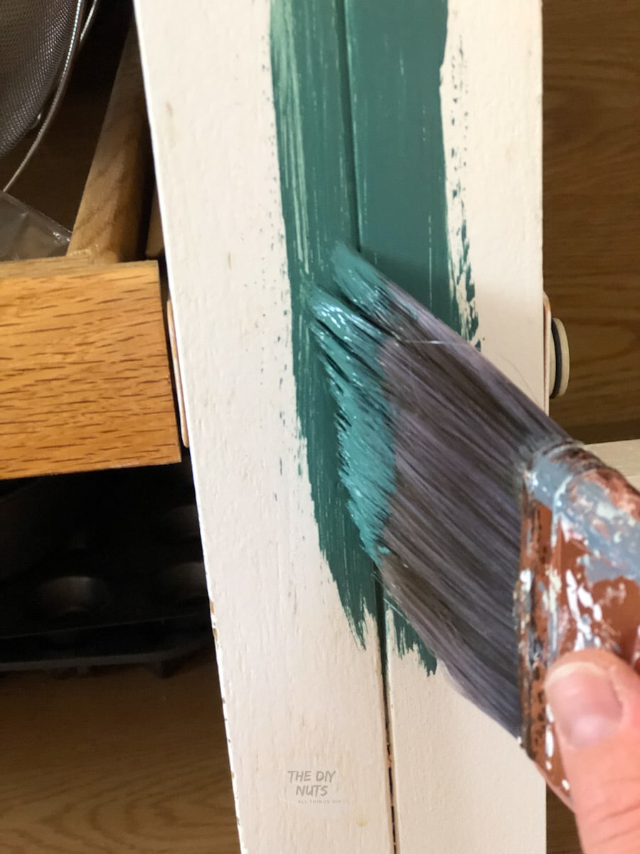 angled brush to paint areas roller can't get on on kitchen cabinets. 