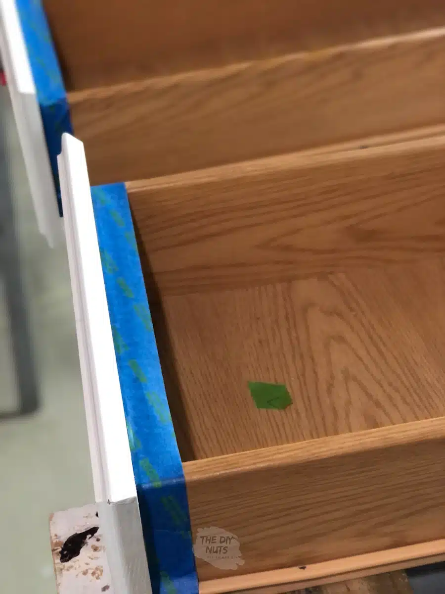 blue painter's tape in the inside of the kitchen cabinet drawers.