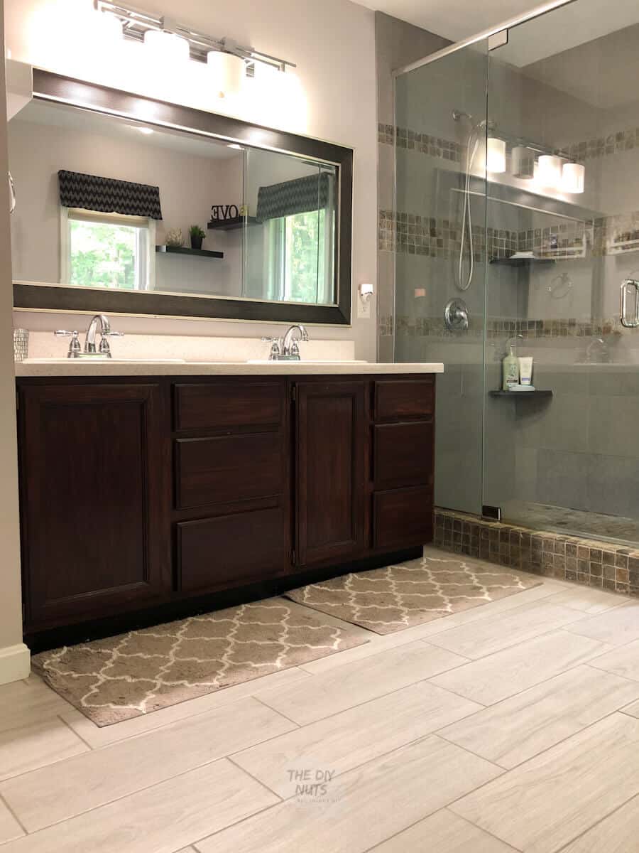 lights on in main bathroom with gray and grayish walls