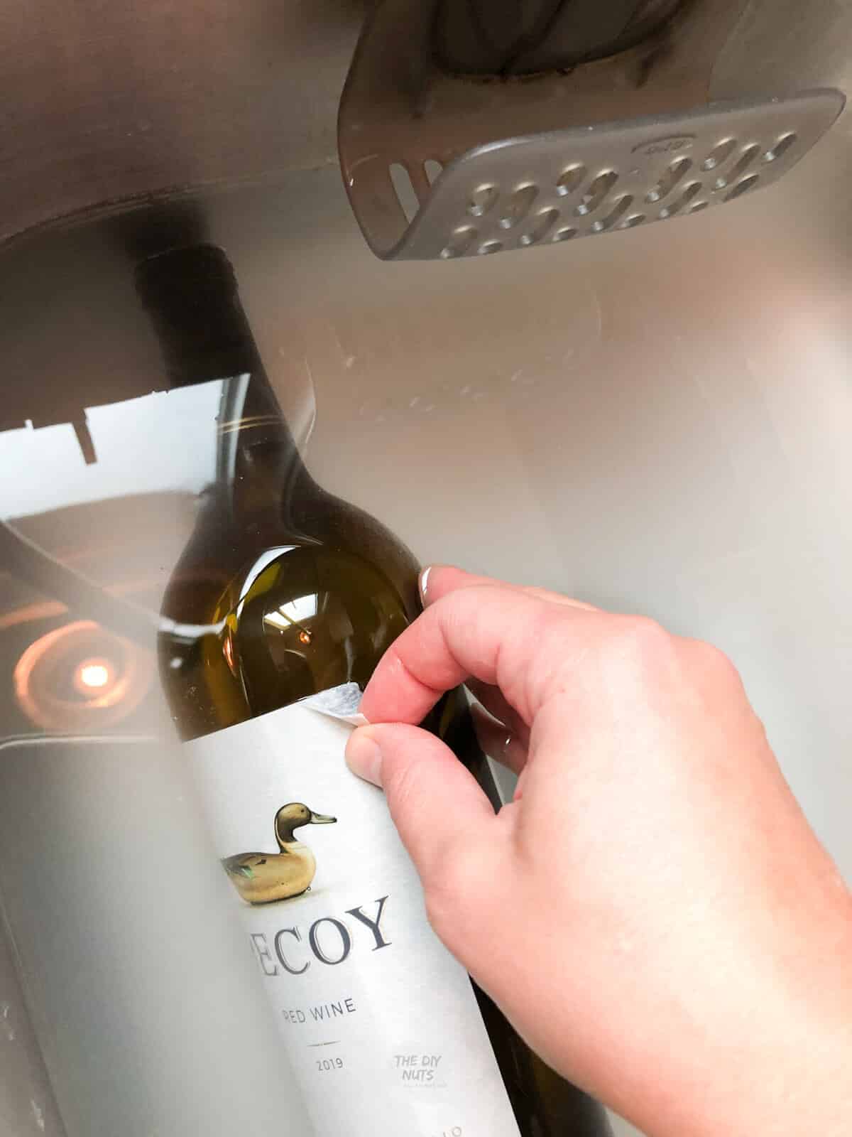 wine label being peeled off