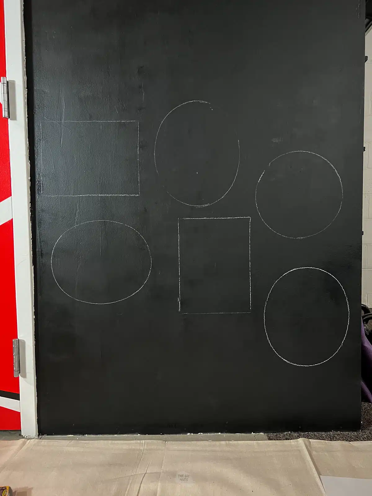 white chalk shapes on chalkboard wall