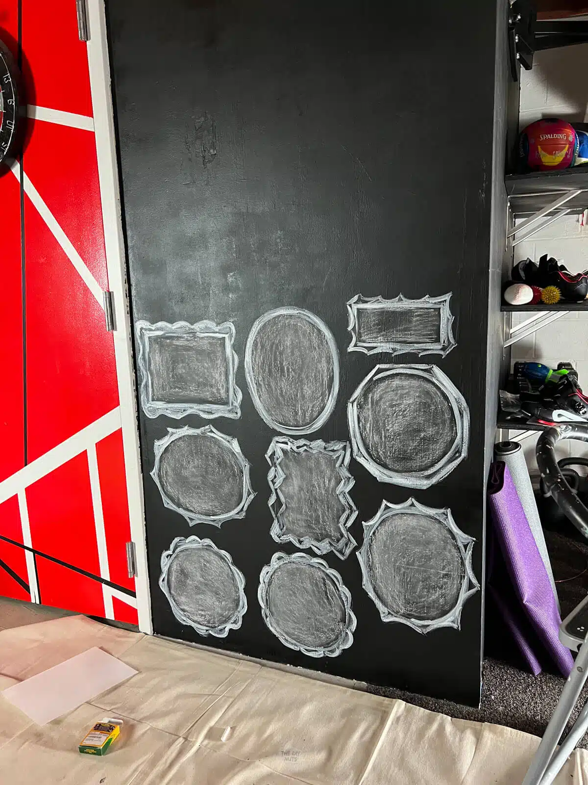 frames on chalkboard painted wall.