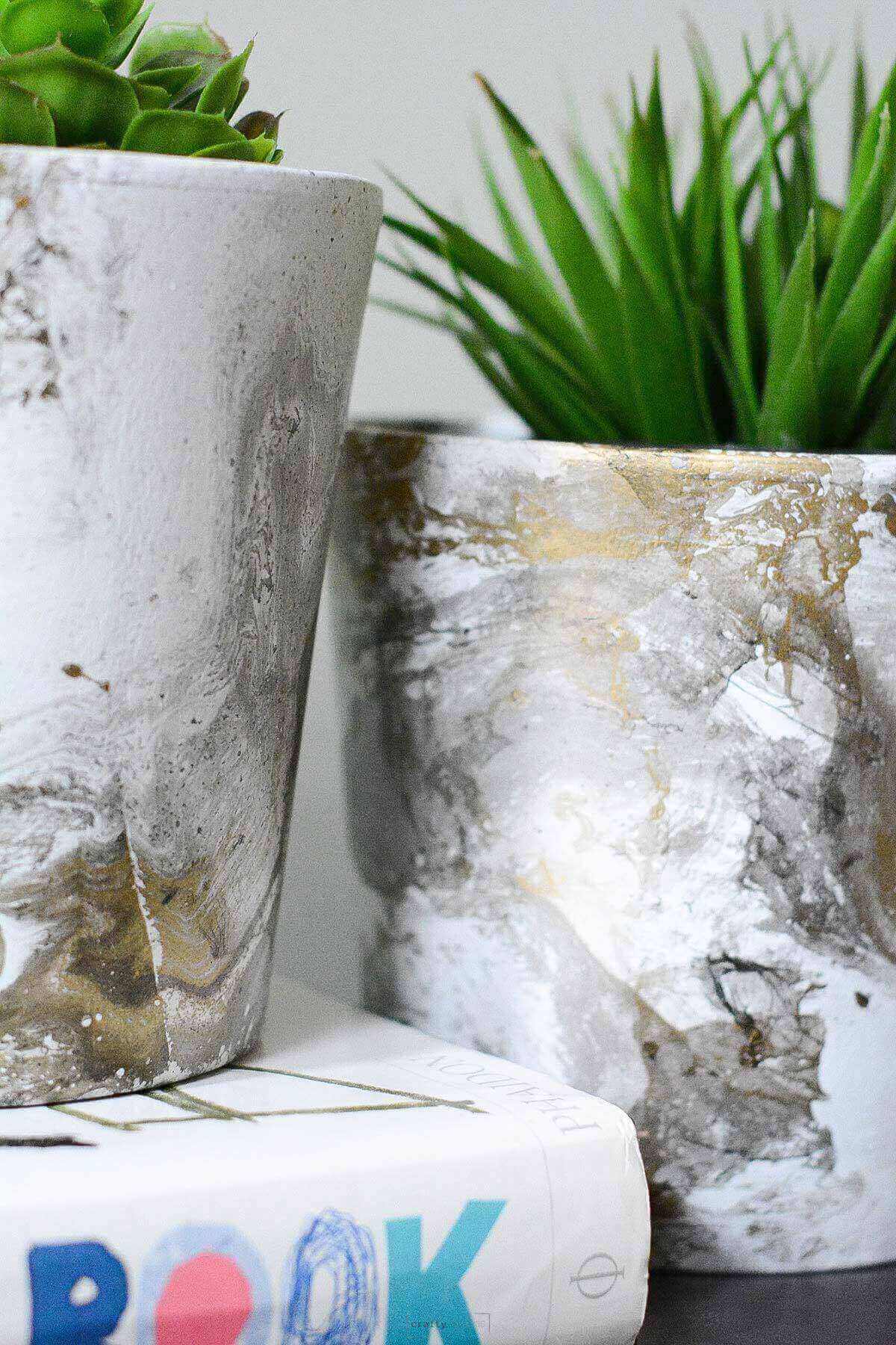 marbled flower pots done with spray paint.