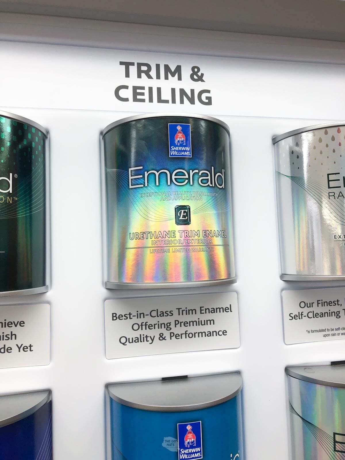 emerald paint on display in Sherwin Williams store.