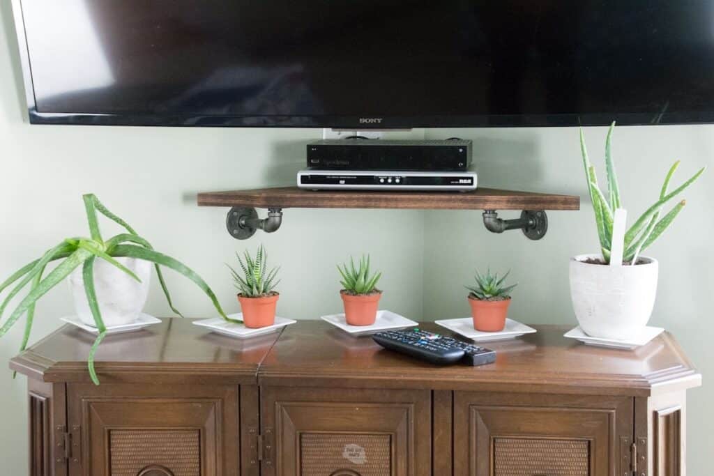 DIY Pipe Corner Shelf For Under Your Mounted TV - The DIY Nuts