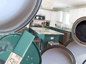 collage of paint cans and paint sticks with corner view of kitchen with white and green painted cabinets.